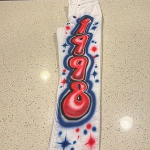 Spray painted 1998 white Levi’s jeans
